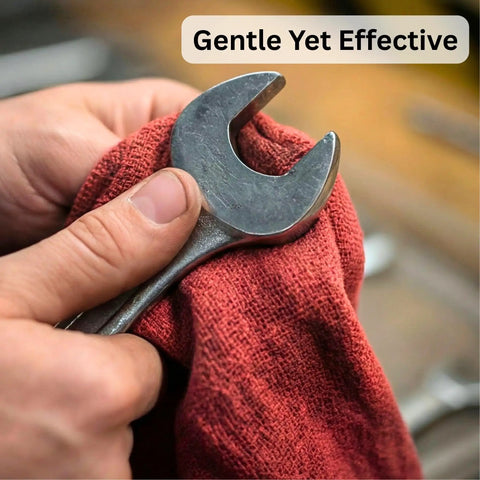 Close-up of hand using Red Cotton Shop Towels 12 Pack For Garage And Auto Care Ultra Absorbent Reusable Lint Free Rags on a wrench