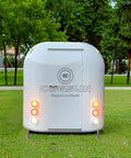 Custom Stainless Steel Food Truck Trailer With Turnkey Kitchen Setup For Mobile Coffee Or Hot Dog Business Built Heavy Duty To Level Up Your Street Vendor Hustle Today, view from the back in a park.