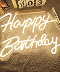 Lit Adjustable Dimmable Happy Birthday Neon Sign LED Light Up Backdrop For Parties, set on a textured background, glow effect.