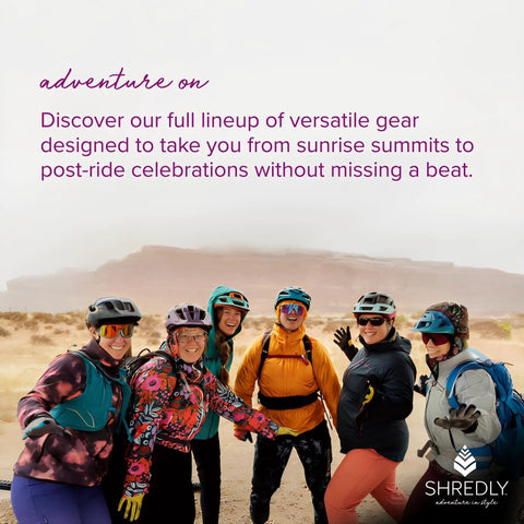 Group of women in colorful activewear posing outdoors in desert landscape, promoting versatile gear for adventure.