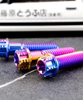 Pack Of 4 Grade 5 Titanium Torx Bolts M10 X 1.25 Pitch Brake Caliper Screws Dual Drive Flange Head assorted lengths in vibrant colors.