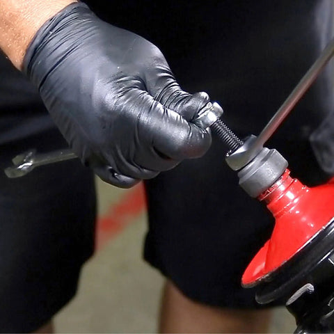 Hands using Power Steering Pulley Puller And Installer Kit All In One Tool For Ford GM VW Chrysler Cars on a Saginaw pump.