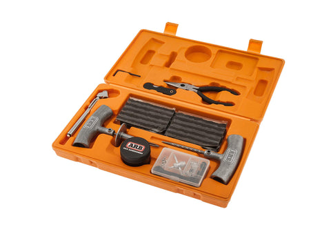 Open case of Speedy Seal 2 Universal Heavy Duty Tire Repair Kit For Car, Truck, RV, Jeep, ATV, Motorcycle, Tractor And Trailer With 40 Vulcanizing Cords To Plug Flats Fast, Plus Insertion Needle, Reamer, Pliers, Valve Cores, Caps, And Pencil Gauge.