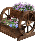 Front view of a Wooden Wagon Planter Box With Wheels For Indoor And Outdoor Patio Garden Decor Ideal For Flowers Herbs Vegetables And Succulents