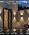 Four Pack Solar Wall Lights For Outdoor Use With Dusk To Dawn Sensor illuminating wall near door, showcasing modern design and vibrant lighting.