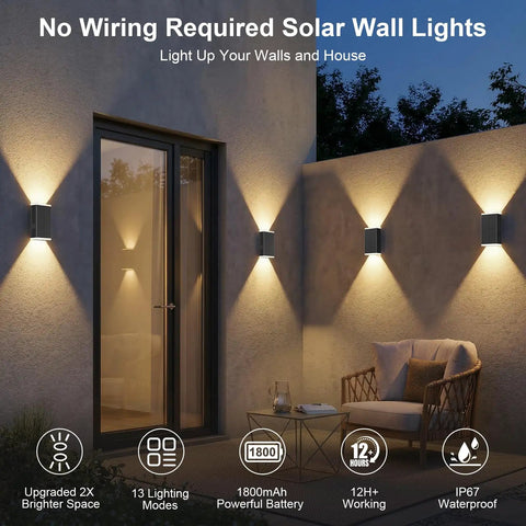 Four Pack Solar Wall Lights For Outdoor Use With Dusk To Dawn Sensor illuminating wall near door, showcasing modern design and vibrant lighting.