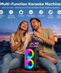 Couple enjoying Karaoke Machine For Adults And Kids Portable Bluetooth Speaker With Two Wireless Microphones TWS Mode And LED Light 15W PA System For Home Parties