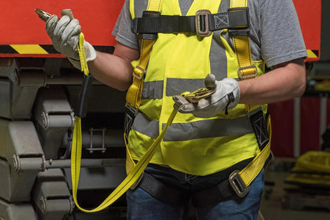 Worker using Non Shock Absorbing Lanyard 4 Ft With Self Locking Steel Hooks Durable 1 Inch Nylon Webbing for safety harness.