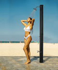7Ft Outdoor Solar Heated Shower With 360 Degree Rotating Head, Foot Shower Faucet, Temperature And Pressure Control, Freestanding 9.2 Gallon Tank For Backyard Pool And Garden in use at the beach