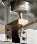 Precision 6-32 Plug Tap And No. 36 Drill Bit Combo Set For Right Hand Threads in use on a metal workpiece.
