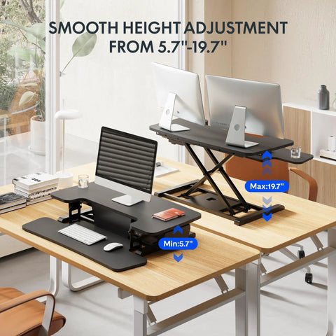 35 Inch Electric Standing Desk Converter With Slick Quiet Lift Height Adjustable Stand Up Riser Dual Monitor And Laptop Setup Wide Keyboard Tray Black Finish, showing adjustable height range.