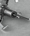 Close-up of Heavy Duty 50 Ton Hydraulic Gear Puller With Split Type Bearing Puller Tool on textured surface
