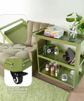 Green 3 Tier Rolling Tool Cart With Lockable Silent Wheels And 330 Lbs Capacity in a home setting, used as a storage cart.