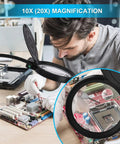 Man using Lighted Floor Magnifier With Stand Featuring 10X And 20X Lenses, 36 LED Dimmable Gooseneck Reading Lamp for electronics repair