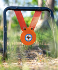 Mini Gong Steel Shooting Target For.22 Caliber With Stand in outdoor setting