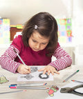 Child using colored pencils on heat shrink creations, part of Kickstart Your Craft Game With This Hella Cool 198 Piece Heat Shrink Plastic Sheet Kit.