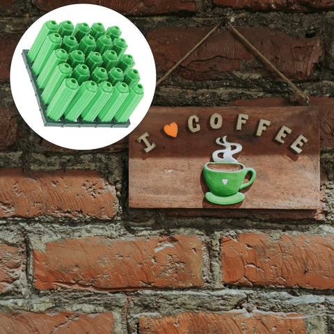Green Plastic Drywall Anchor Kit With Self Tapping Screws for gypsum shown on brick wall next to coffee art sign