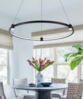 Dope Sleek Black Circular Ring LED Pendant Light Dimmable Ceiling Fixture 23.6 Inch Hanging Pendant in dining room setting.