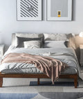Rock Solid King Platform Bed Frame 14 Inch Profile Genuine Rubber Wood Heavy Duty Slat Support Premium Mattress Foundation No Box Spring Needed Hassle Free Setup Dark Walnut displayed with gray bedding and pillows.