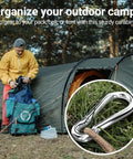 Man organizing camping gear outside tent with Stainless Steel Spring Snap Hook Carabiner Clips Set Of 6 For Camping Hiking Ropes Keys And Gear