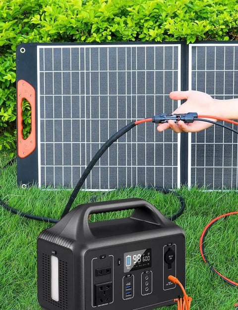 Person using All-In-One 7-In-1 Solar Panel Connector Kit With DC Adapters on Yeti power station and solar panel