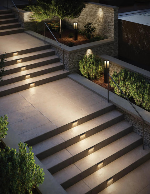 12V Integrated LED Horizontal Step Light With Recessed Mount, Etched Glass, Satin Black Finish illuminating outdoor stairs