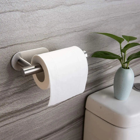Stick On Toilet Paper Holder No Drilling Stainless Steel Brushed Finish Easy Install for bathroom, mounted on wall near plant