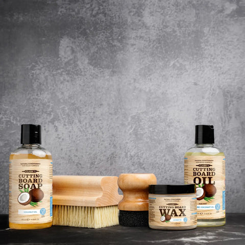 Fractionated Coconut Oil Cutting Board Oil for Kitchen Counters with soap, brush, wax beside cutting board