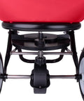 Red Pro Grade Heavy-Duty 100 Lb Broadcast Fertilizer Spreader base showing gearbox and handle with large pneumatic tires