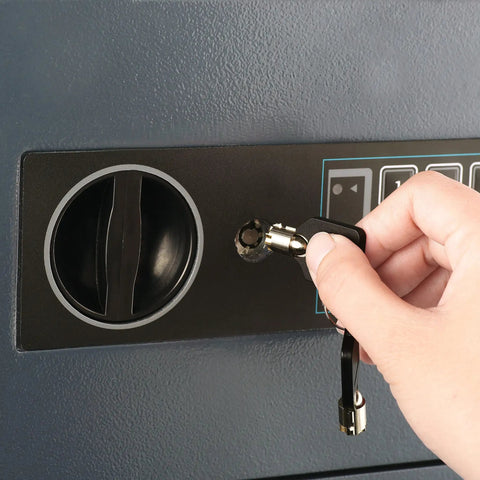 Person unlocking Digital Drop Safe Money Drop Box With Front Deposit Slot, Steel Security Safe With LED Keypad, Wall Or Floor Mount, Compact Black Safe For Home And Small Biz, 0.54 Cubic Feet with key