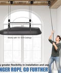 Overhead Garage Ceiling Hoist System For Kayaks, Canoes, Bikes And Ladders, Heavy Duty Pulley Lift Holds Up To 150 Lbs, Fits 10 To 18 Foot Ceilings in use