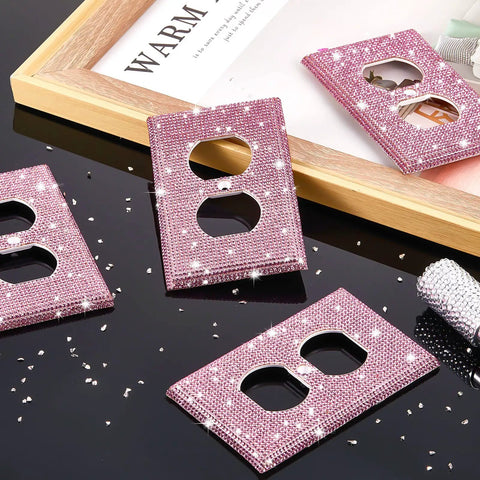 Pink Rhinestone Light Switch Covers Set of 4 Sparkly Wall Plate Covers on black surface with scattered crystals