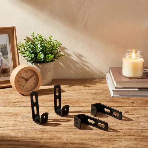 Four heavy duty black angled J clips from the Top Shelf 4 Pack Bunk Bed Ladder Hook Brackets for RV hardware.