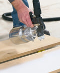 Hand using a stationary HVLP finishing sprayer for woodworkers wanting killer results on furniture restoration projects.