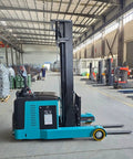 Industrial Electric Pallet Stacker For Warehouse Operations And Heavy Duty Lifting Equipment That Handles Any Load Like A Champ While Keeping Crews Moving Smooth, side view in warehouse.