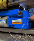 Ultra Low Profile Right Angle Magnetic Drill Fabricator Kit 25 Lbs Lightweight on steel, producing metal shavings.