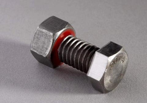 Close-up of nut and bolt with Red Thread Locker TL71, 10 mL, vibration-resistant locking compound visible
