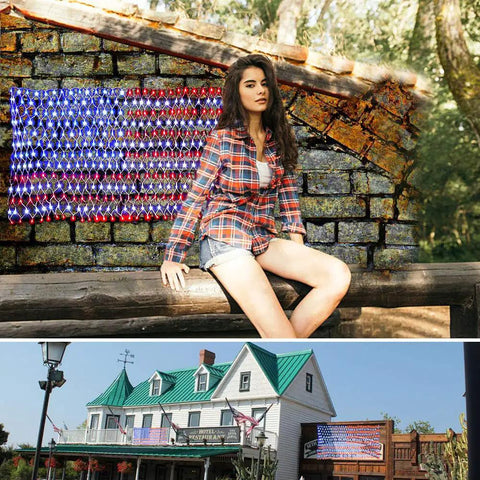 Patriotic Solar Powered LED Flag Net Lights with 420 Bright LEDs on house wall and brick backdrop, outdoor flag decoration