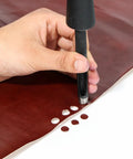 Hollow Leather Hole Punch Set 1mm To 10mm, 10-Piece Carbon Steel Leather Punch Tool being used on brown leather