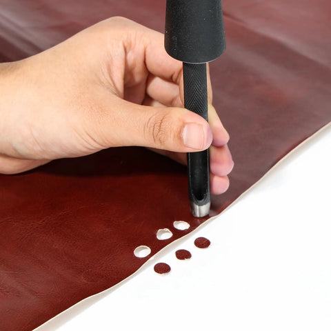 Hollow Leather Hole Punch Set 1mm To 10mm, 10-Piece Carbon Steel Leather Punch Tool being used on brown leather