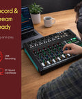 Ten Channel Studio DJ Mixer With Bluetooth And XLR Combo Mic Inputs USB MP3 Playback PC Recording DSP Effects LED Level Meters Smooth Dials And Faders For Live Shows Home Studio And Podcast Setups on desk with laptop