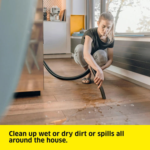 Person using 5.3 Gallon Wet And Dry Shop Vacuum With Attachments For Home Garage And Workshop Pro Grade Suction on floor spill.