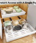Make Kitchen Storage A Cinch With This Expandable Pull Out Organizer Featuring Full Extension Roll Out Slides And Raised Pads For Framed Units Organize Pots Slick And No Sweat, showcasing diverse metal pots and pans.