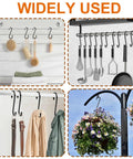 10 Pack 6 Inch Heavy Duty Vinyl Coated S Hooks Non Slip Black used for hanging kitchen tools, coats, and plants.