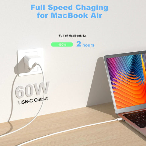 Installed view of white USB-C to USB-C charging cable, 60W, 10ft, 2-pack, plugged into wall outlet and MacBook
