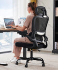 Woman seated in Ergonomic Mesh Office Chair With Wheels For Home Office, 330 Lb Capacity, Adjustable Lumbar Support, Headrest And Armrests