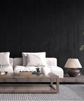 Hassle Free Peel And Stick Acoustic Wall Panels 10 Pack Sound Dampening Foam Tiles Noise Killing Room Decor Black 48X24 Inch displayed in a living room.