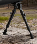 Three In One Rifle Bipod With Picatinny Rail Mount Swivel Stud And Barrel Clamp Adapters, adjustable aluminum legs on rocky terrain