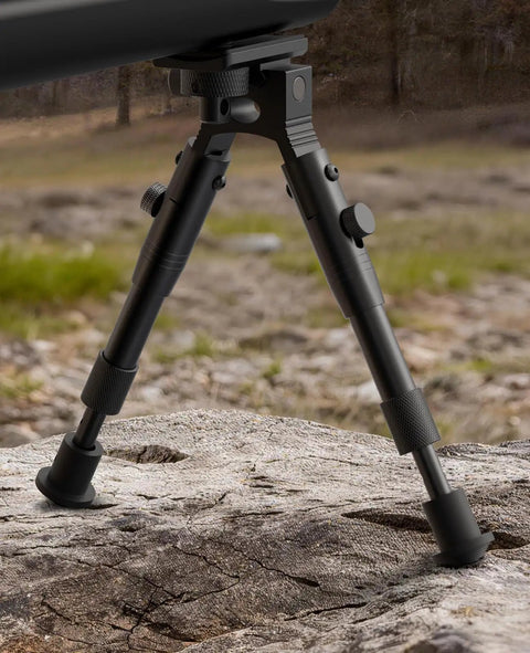 Three In One Rifle Bipod With Picatinny Rail Mount Swivel Stud And Barrel Clamp Adapters, adjustable aluminum legs on rocky terrain