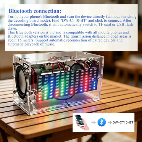 DIY Soldering Practice Kit And Electronic Speaker Build Project with LED lights, transparent acrylic shell on a wooden table.